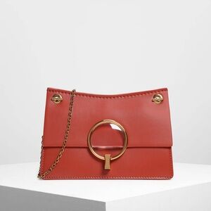 Charles & Keith metal half round synthetic leather red crossbody nwot gold metal
